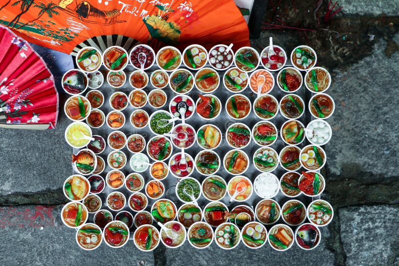 Street food in tiny bowls, arranged to an almost rectangular shape, in Hoi An, Vietnam. Street food in tiny bowls, arranged to an almost rectangular shape, in Hoi An, Vietnam.