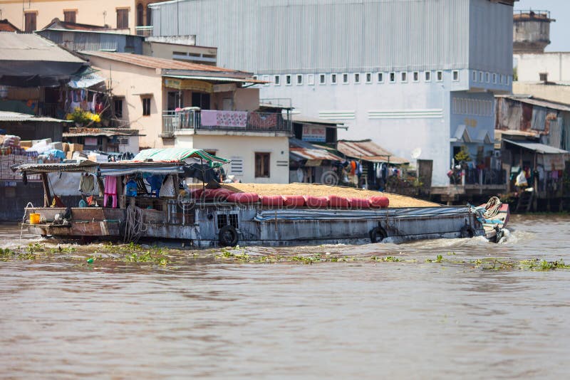 Vietnamese boat loaded with rice, Cai Be, Mekong Delta, Vietnam