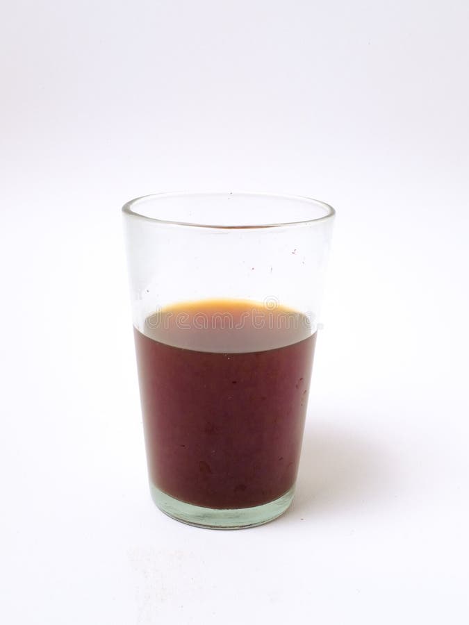 Vietnamese Coffee in Glass Cups and Traditional Metal Coffee Maker Phin