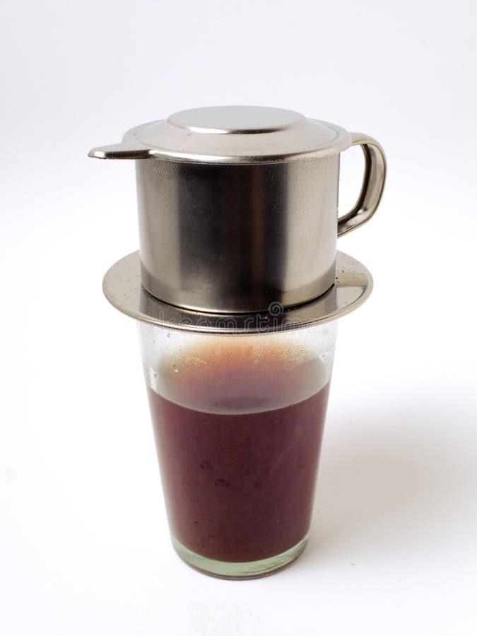 Vietnamese Coffee in Glass Cups and Traditional Metal Coffee Maker Phin