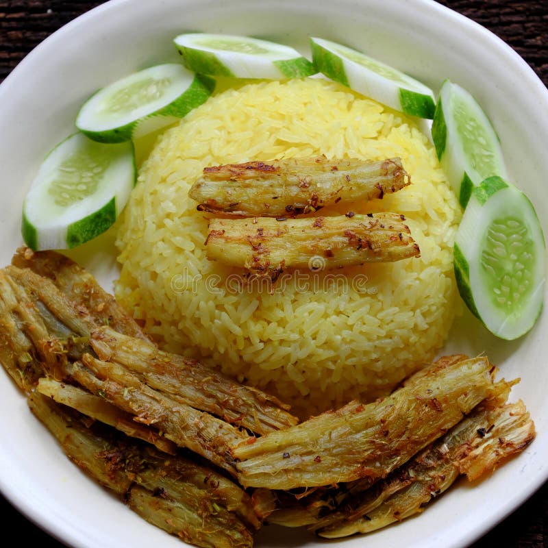 Vietnamese cuisine with vegan rice dish, arrowroot fried with citronella, vegetarian meal for dinner royalty free stock photos Vietnamese cuisine with vegan rice dish, arrowroot fried with citronella, vegetarian meal for dinner royalty free stock photos