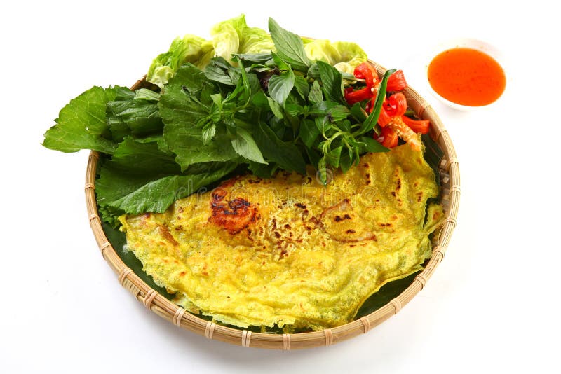 Vietnamese rice pancake or banh xeo with herbs and chili sauce o royalty free stock photos Vietnamese rice pancake or banh xeo with herbs and chili sauce o royalty free stock photos