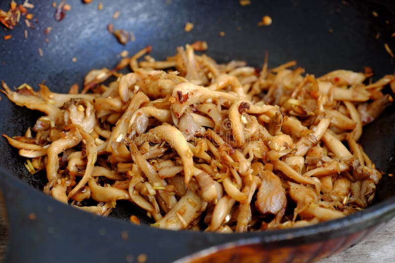 Vegan food, abalone mushroom fry with lemongrass chopped, soy sauce for vegetarian meal stock images Vegan food, abalone mushroom fry with lemongrass chopped, soy sauce for vegetarian meal stock images