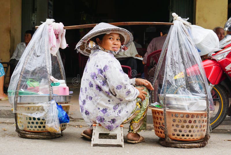 Vietnamese woman street vendors in Saigon stock photos Vietnamese woman street vendors in Saigon stock photos