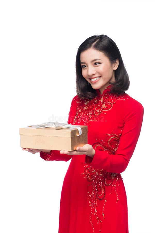 Vietnamese Young Woman in Ao Dai Dress Holdi