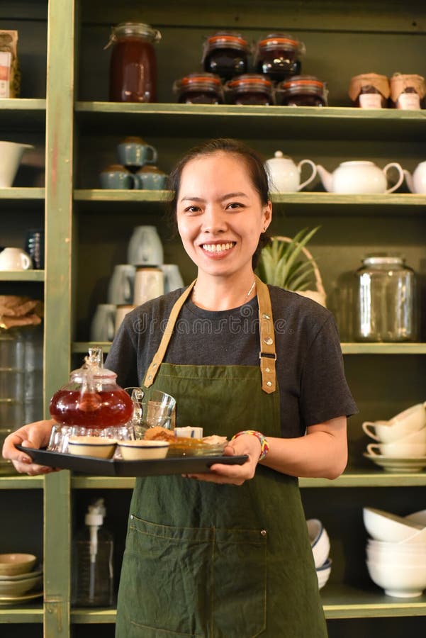 Vietnamese Young Woman Serving Tea in a Coffee Shop Stock Photo Image of cooking, beauty