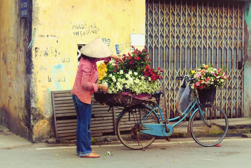 Vietnamesisk blomsterhandlareförsäljare i Hanoi