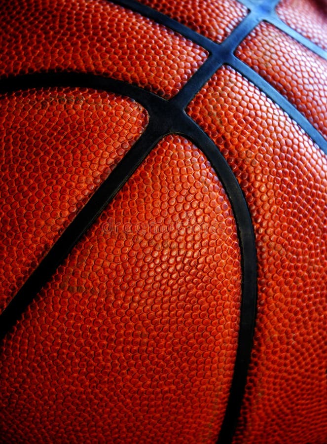 Closeup of texture on old worn leather basketball. Closeup of texture on old worn leather basketball