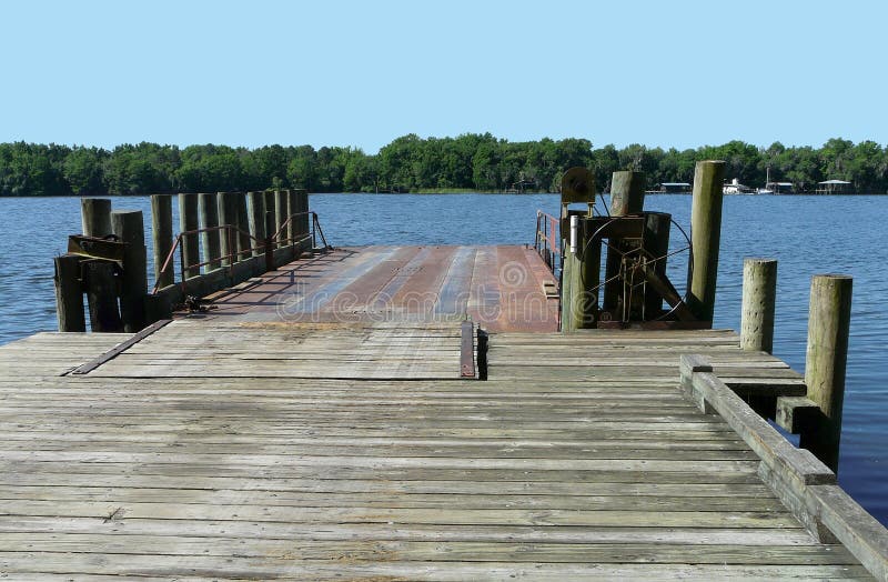 Old, working 2-car public ferry in a remote part of Florida near Georgetown. Serves Drayton Island on the St. Johns River, and dates to 1943. Old, working 2-car public ferry in a remote part of Florida near Georgetown. Serves Drayton Island on the St. Johns River, and dates to 1943.