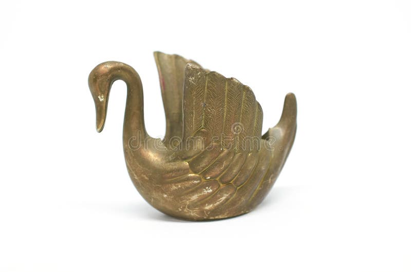 Vieux chandelier en bronze dans le cygne de forme d'isolement sur un fond blanc images libres de droits Vieux chandelier en bronze dans le cygne de forme d'isolement sur un fond blanc images libres de droits