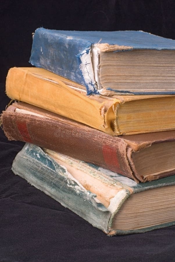 Old books on a black background. Old books on a black background