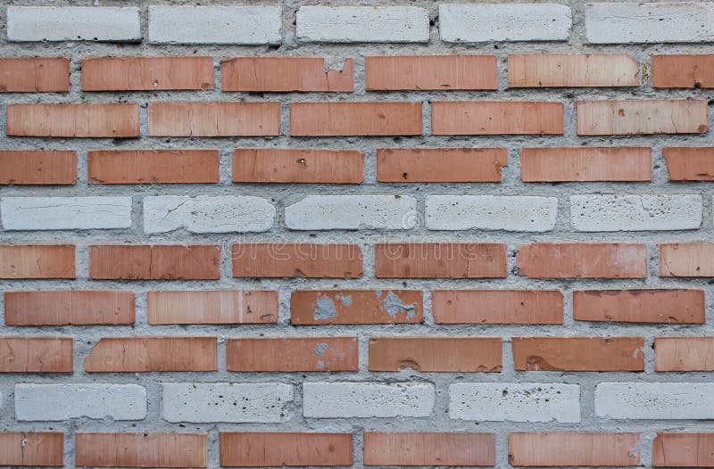 Vieux mur de briques de fente photo stock Vieux mur de briques de fente photo stock