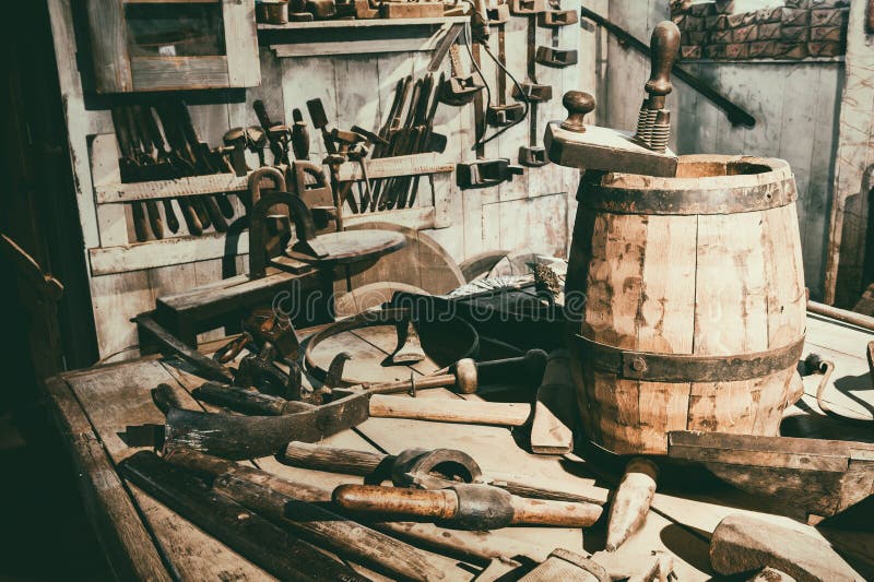 Old hand tools in vintage workshop setting. Old hand tools in vintage workshop setting