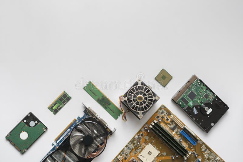 View from above flat lay of computer components details on the colorful background stock photo