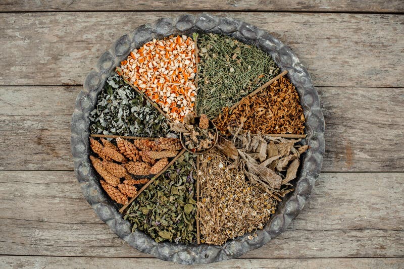 View from above large round dish divided into sections with dry herbs stock photos View from above large round dish divided into sections with dry herbs stock photos