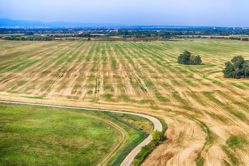 View of agricultural fields and road in summer, Slovakia. Aerial view