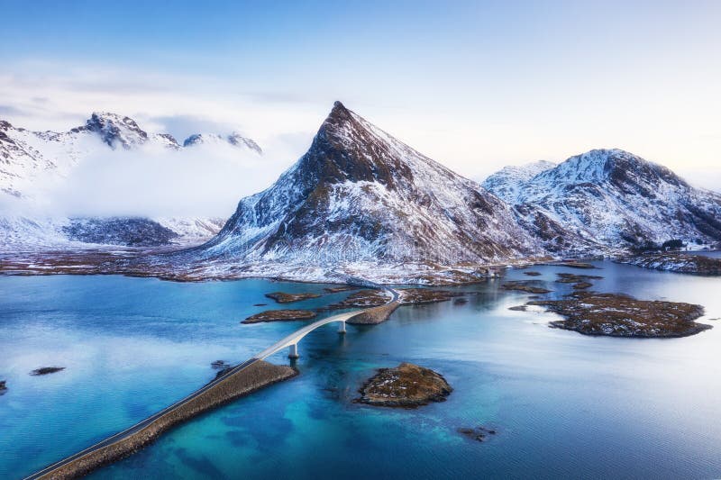 View from the air on the bridge and mountains during sunset. Lofoten Islands, Norway. Landscape from the drone