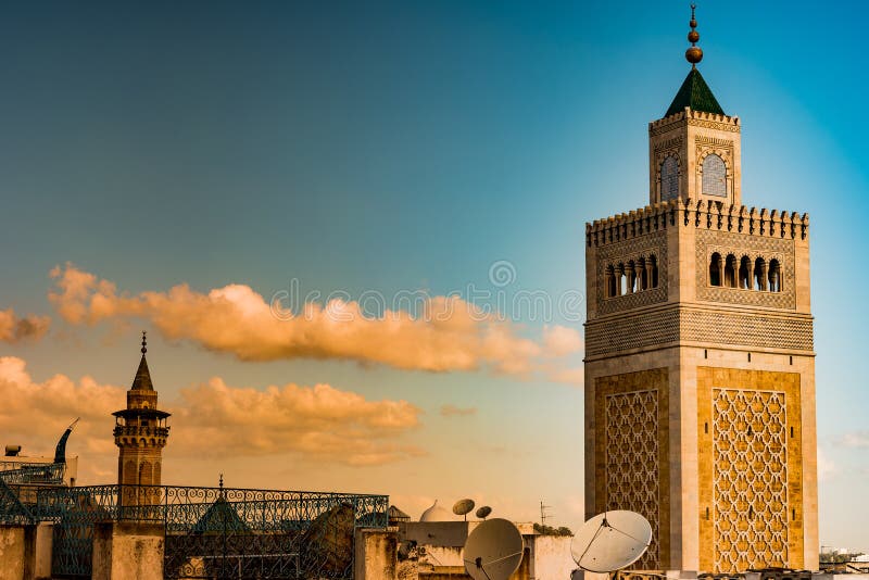 View of the Al-Zaytuna Mosque and the skyline of Tunis at dawn. The mosque is a Landmark of Tunis. Tunisia, North africa.