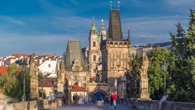 A view along Charles Bridge in Prague towards the Lesser Quarter in the morning timelapse. stock video footage A view along Charles Bridge in Prague towards the Lesser Quarter in the morning timelapse. stock video footage