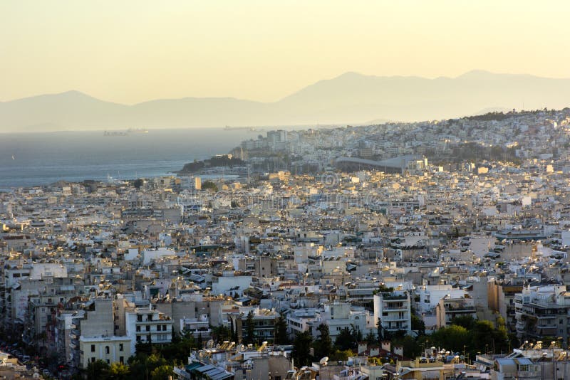 View of Athens and the Saronic Gulf from above, sunset over the stock photography View of Athens and the Saronic Gulf from above, sunset over the stock photography