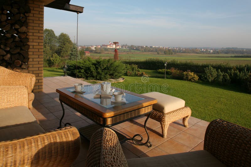 View from the Backyard Patio. Beautiful view into the distance from this backyard patio of a house on a hill stock images