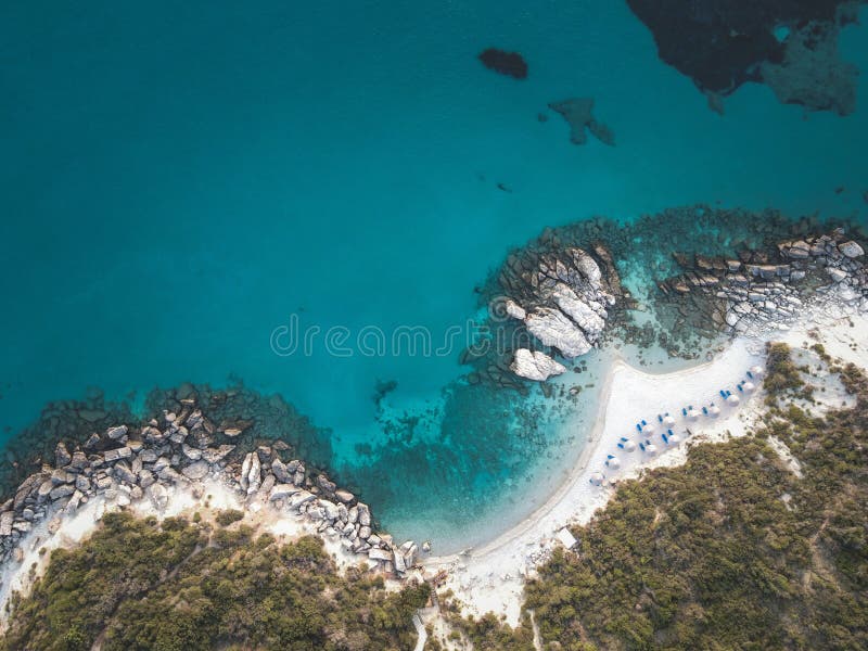 View of a beautiful beach with clear turquoise waters and rocky coastline on Zakynthos Island stock image