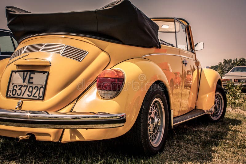 Yellow Volkswagen Beetle stock photo Yellow Volkswagen Beetle stock photo