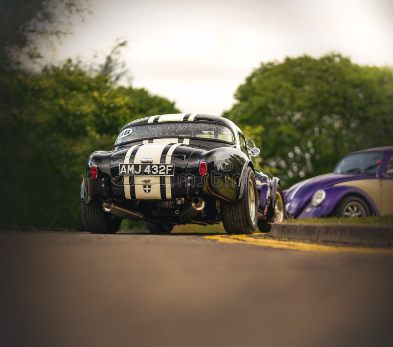 View of a Black AC Cobra Sports Car from Behind Editorial Photography