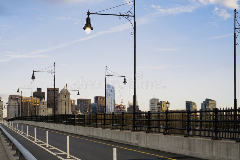 View of Boston skyline and part of street from the Long Fellow bridge on a nice cloudless sky stock photos