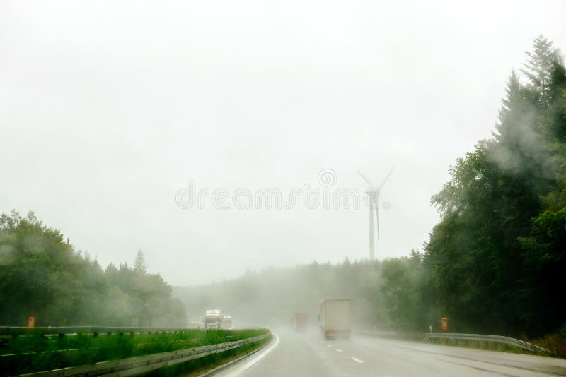 View of busy highway on heavy rain