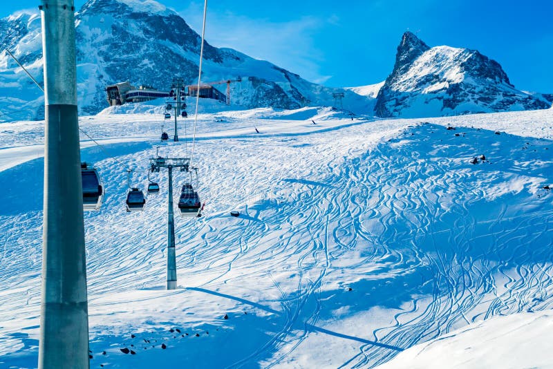 View of cable car to Klein Matterhorn Station with the ski track