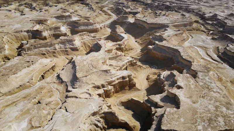 View of canyon from the top. canyon cliffs against the sky. Midbar Yehuda, drone flight over the Judean desert between