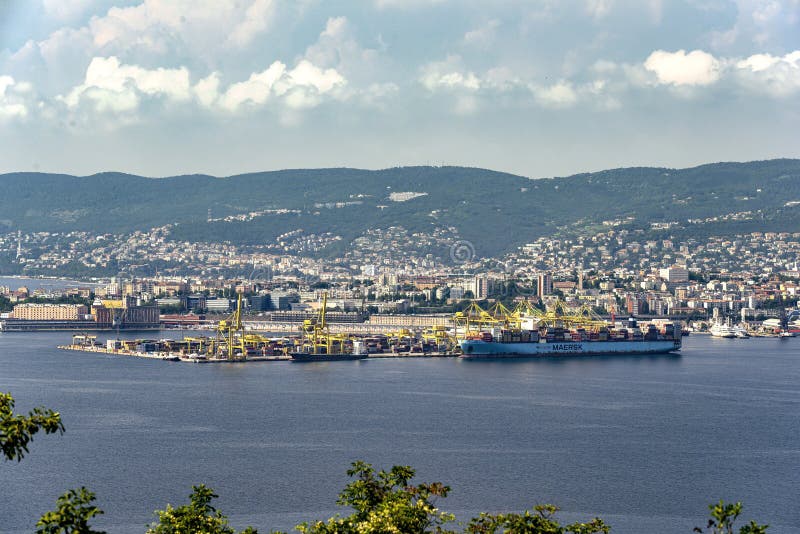 View of cargo ships docked at Pier VII of the Port of Trieste loading:unloading containers royalty free stock photos
