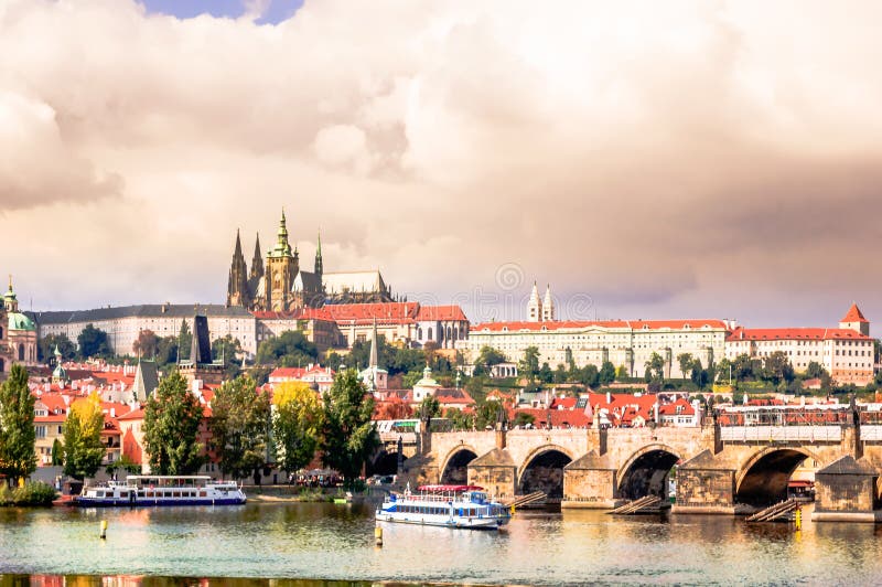 View on Charles Bridge over Vltava and cityscape in Praha