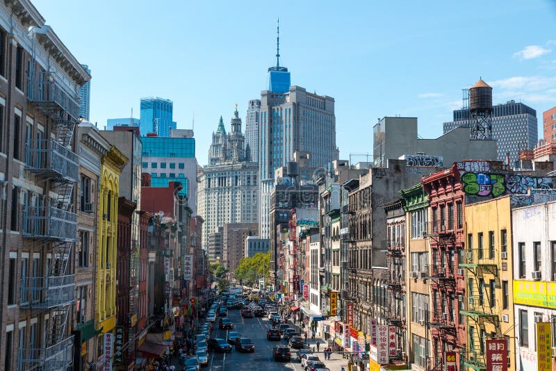 View of colorful and empty street in Chinatown with Municipal Building in background royalty free stock photography View of colorful and empty street in Chinatown with Municipal Building in background royalty free stock photography