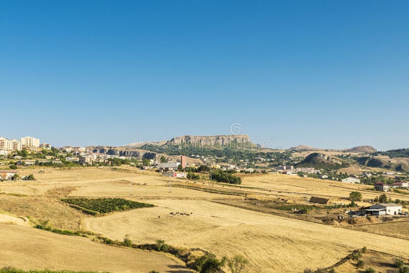 View of Corleone between fields in Sicily, Italy