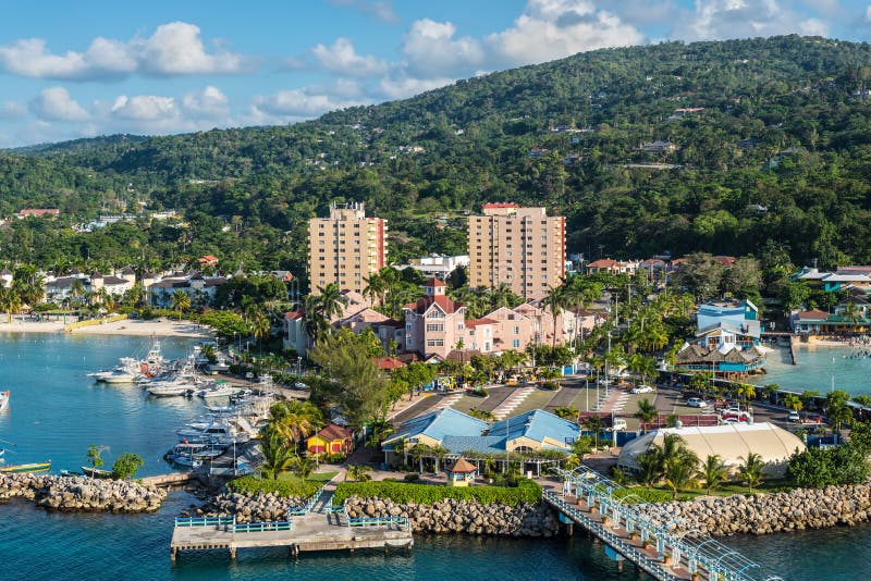 View of the Cruise Terminal in Ocho Rios, Jamaica. Ocho Rios, Jamaica - April 22, 2019: View from the ship to the Cruise terminal in the tropical Caribbean stock image View of the Cruise Terminal in Ocho Rios, Jamaica. Ocho Rios, Jamaica - April 22, 2019: View from the ship to the Cruise terminal in the tropical Caribbean stock image