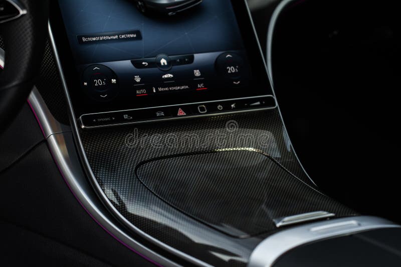 View of dashboard with navigation system in modern car. Translation: `Auxiliary systems. Condition menu