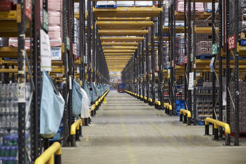 View down a central aisle in a large distribution warehouse