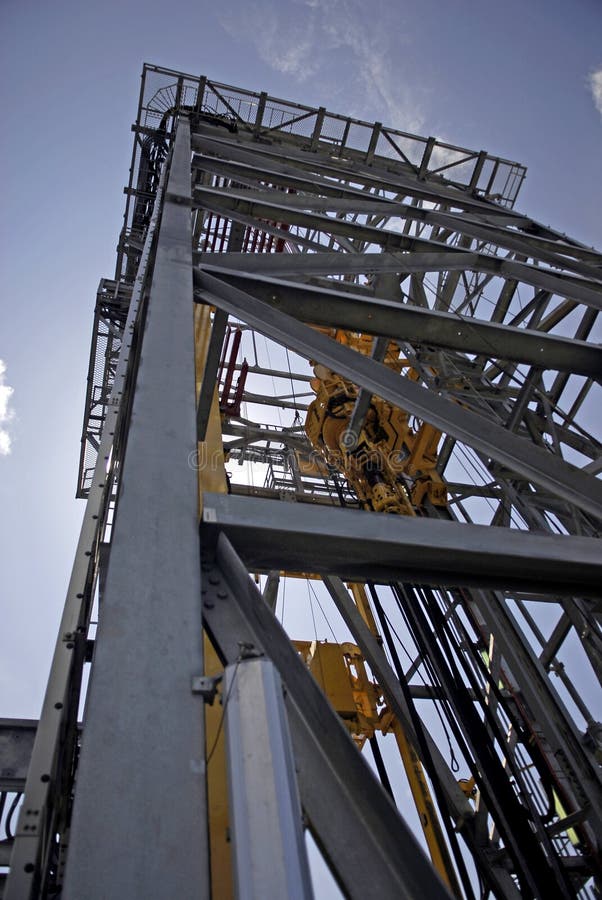 A look upward of an offshore drilling rig derrick. A look upward of an offshore drilling rig derrick