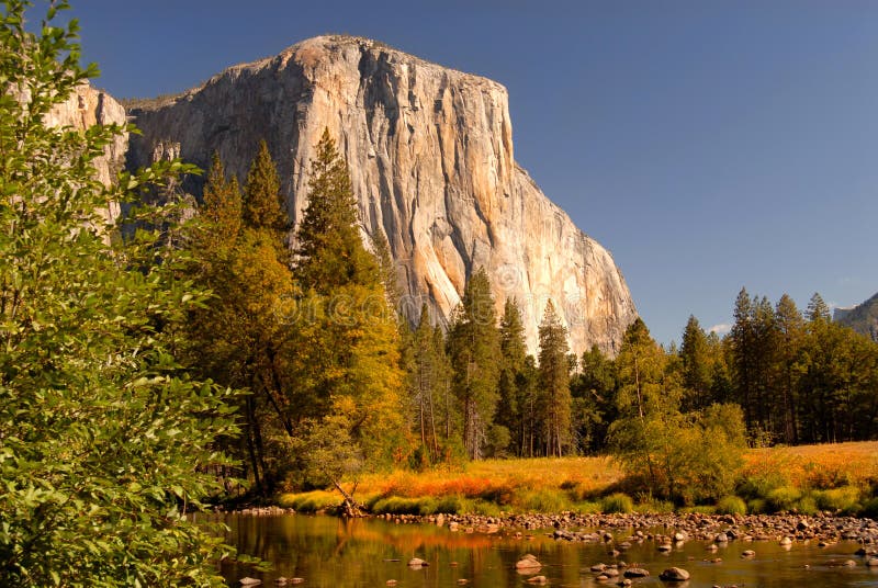 View of El Capitan from Merced River with autumn colors