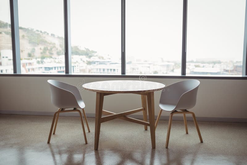 Chairs And Table In Boardroom Stock Image - Image of window, people