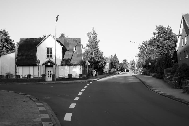 View Of Empty Street In Neighborhood Suburban Area In Germany During view-of-empty-street-in-neighborhood-suburban-area-in-germany-during