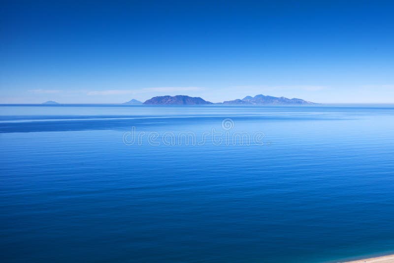 Eolie islands in Tyrrhenian sea, Sicily. This is a view of Eolie island in Tyrrhenian sea in Sicily. Typical marine landscape from Messina coast stock images Eolie islands in Tyrrhenian sea, Sicily. This is a view of Eolie island in Tyrrhenian sea in Sicily. Typical marine landscape from Messina coast stock images