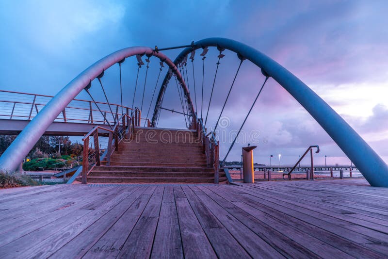 View of footbridge in Frankston foreshore at sunset. royalty free stock photo