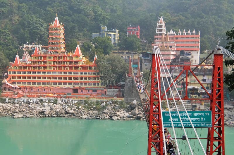 View of Ganga river embankment, Lakshman Jhula bridge and Tera Manzil Temple, Trimbakeshwar in Rishikesh