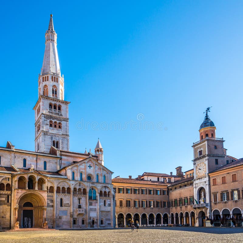 View at the Grande place with Ghirlandina tower of Cathedral and City hall in Modena - Italy royalty free stock images View at the Grande place with Ghirlandina tower of Cathedral and City hall in Modena - Italy royalty free stock images
