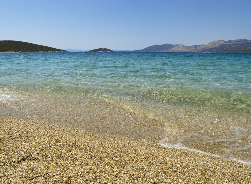 View of a Great Sand beach in the Aegean sea near the town of Marmari on the Greek island of Evia in Greece on a Sunny day