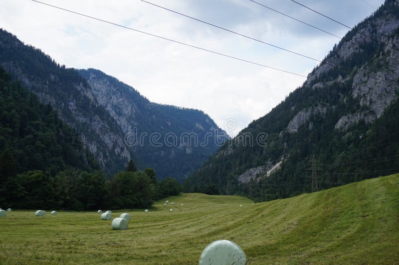 View from the green field to the Mountains. stock images View from the green field to the Mountains. stock images