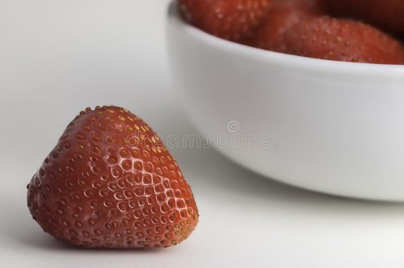 Strawberry in bowl stock photography